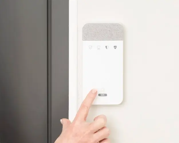 SOS-alarm på vegg SOS-alarm på vegg